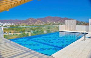 Bazén v ubytování Linda y confortable suite en Santa Marta nebo v jeho okolí