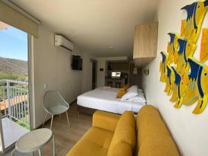 Postel nebo postele na pokoji v ubytování Linda y confortable suite en Santa Marta