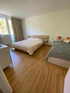 Ένα ή περισσότερα κρεβάτια σε δωμάτιο στο Apartament Lidia