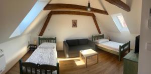Voodi või voodid majutusasutuse Apartmány Statek Bezdědice toas