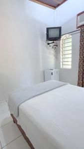 Canoas Hotel客房内的一张或多张床位