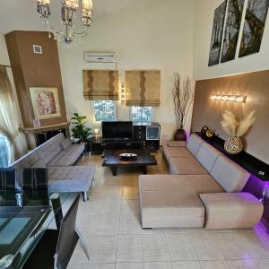 Posezení v ubytování paralia ofriniou beautiful house + 52 fotografií