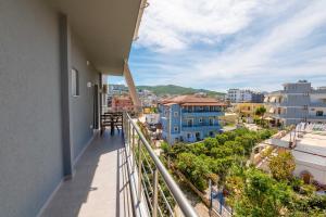 a balcony with a view of a city at Apartments Mario in Ksamil