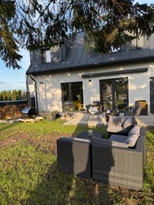 Afbeelding uit fotogalerij van Koniec Świata dom 84m2 z balią i basenem na wyłączność in Mikołajki +145 foto's