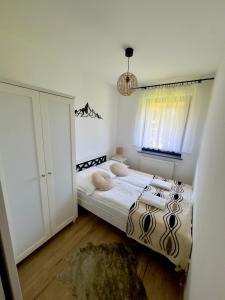Posteľ alebo postele v izbe v ubytovaní Apartament w Białce Tatrzańskiej