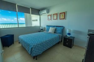 Postelja oz. postelje v sobi nastanitve Lovely 2-2 Condo with the best view of Puerto Rico