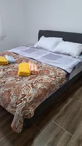 Postel nebo postele na pokoji v ubytování Apartman5