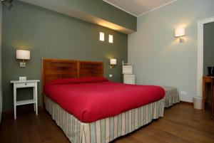 Postel nebo postele na pokoji v ubytování B&B Residenza Cavour