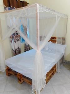 Mount Zion Guest House, Mtwapa Mtomondoni客房内的一张或多张床位