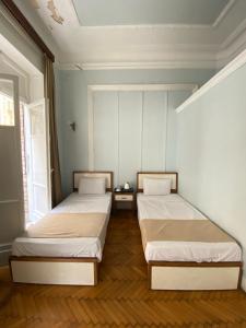 Voodi või voodid majutusasutuse The Sufi House Hostel toas