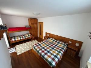 Postel nebo postele na pokoji v ubytování Marmolada Escape