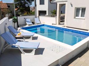 Bazén v ubytování Holiday Home Sea nebo v jeho okolí