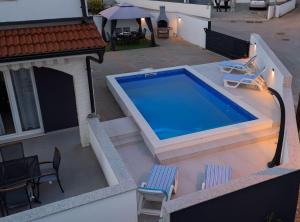Bazén v ubytování Holiday Home Sea nebo v jeho okolí