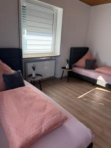 Ένα ή περισσότερα κρεβάτια σε δωμάτιο στο Ina Home