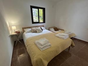 Postel nebo postele na pokoji v ubytování Casa Julián