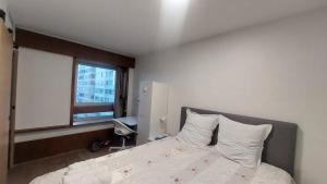 Posteľ alebo postele v izbe v ubytovaní Paris beaugrenelle: charmante résidence