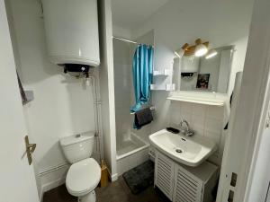 O baie la Appartement Cosy dans le Centre +8 fotografii