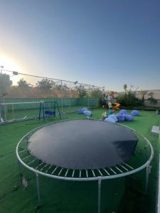 Fotografie z fotogalerie ubytování Farm Football court, Jacuzzi, BBQ Sharjah book and make the first impression v destinaci á¸¨aÅŸat al BidÄ«yah