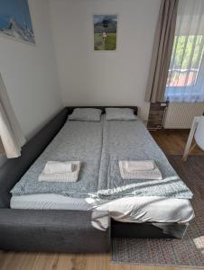 Postel nebo postele na pokoji v ubytování Haus im Hochtal