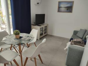 TV/Unterhaltungsangebot in der Unterkunft Cala Ferrera HOME&ME