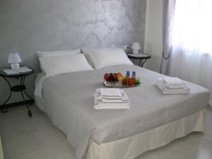 Postel nebo postele na pokoji v ubytování B&B Dolce Risveglio