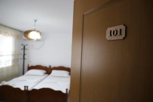Postel nebo postele na pokoji v ubytování Guest House LION