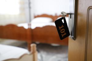 Postel nebo postele na pokoji v ubytování Guest House LION