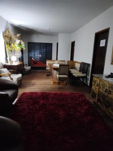 Posezení v ubytování Quarto casal Cianorte