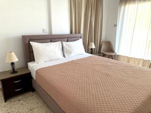 Кровать или кровати в номере Himonas Apartments