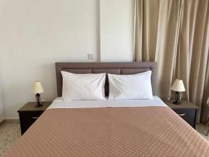 Кровать или кровати в номере Himonas Apartments