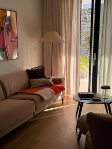 Ein Bett oder Betten in einem Zimmer der Unterkunft Capitol Suites Exclusive