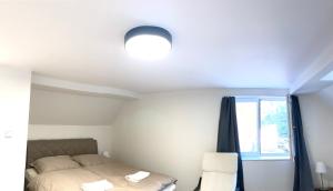 Postel nebo postele na pokoji v ubytování Hotel Labe