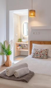 Postel nebo postele na pokoji v ubytování Golden Shellseaside