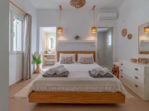 Postel nebo postele na pokoji v ubytování Golden Shellseaside