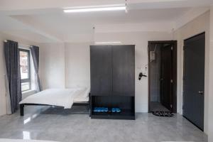 Postel nebo postele na pokoji v ubytování Hotel Leonda-gần chợ đêm-near the night market
