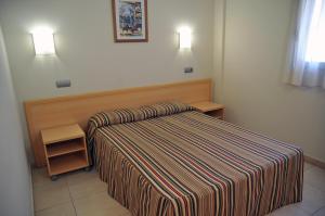 Postel nebo postele na pokoji v ubytování Hotel Blauet by Bossh! Hotels