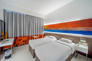 Postel nebo postele na pokoji v ubytování Citymax Hotel Ras Al Khaimah + 25 fotografií