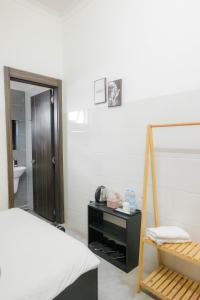 Postel nebo postele na pokoji v ubytování Hotel Leonda-gần chợ đêm-near the night market