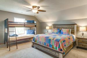 a bedroom with a bunk bed and a ceiling fan at Game Room and Hot Tub Spacious Retreat in Hollister in Hollister +37 photos