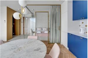 Posteľ alebo postele v izbe v ubytovaní Prestige Apart Gdańsk
