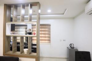 Kuchyň nebo kuchyňský kout v ubytování Serviced Apartment Direct