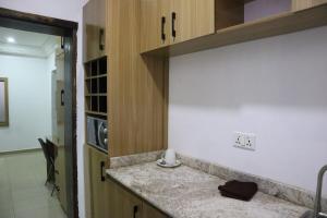 Kuchyň nebo kuchyňský kout v ubytování Serviced Apartment Direct