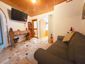 TV a/nebo společenská místnost v ubytování Tina's House - Alpine Stay Apartments