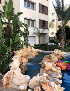 Фотография из галереи LV luxury apartment Deir Ghbar в Аммане