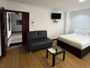 Postel nebo postele na pokoji v ubytování Gaviota Apartments & Suites