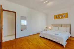 Imagen de la galería de Quarto duplo com vista rio num apartamento partilhado, en Bobadela