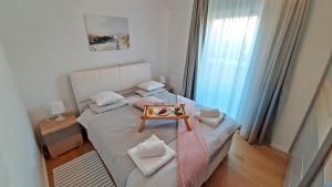 リエカにあるRio Vitaの小さなベッドルーム(トレイ付きのベッド付) +22枚の写真