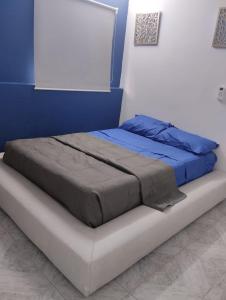 Postel nebo postele na pokoji v ubytování Casa León
