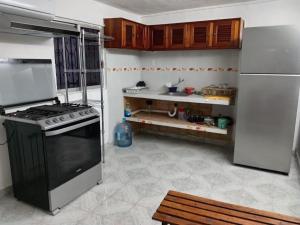 Kuchyň nebo kuchyňský kout v ubytování Casa León