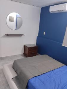 Postel nebo postele na pokoji v ubytování Casa León